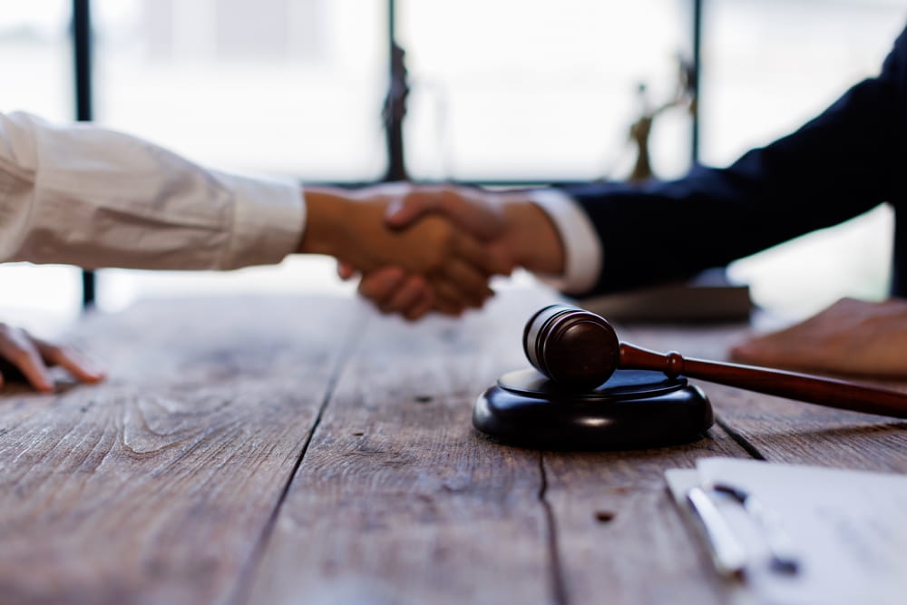 Client meeting with Greene County injury lawyer to review documents
